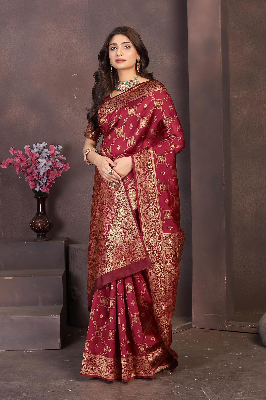 Rich Maroon Banarasi Silk Saree with Intricate Golden Zari Work