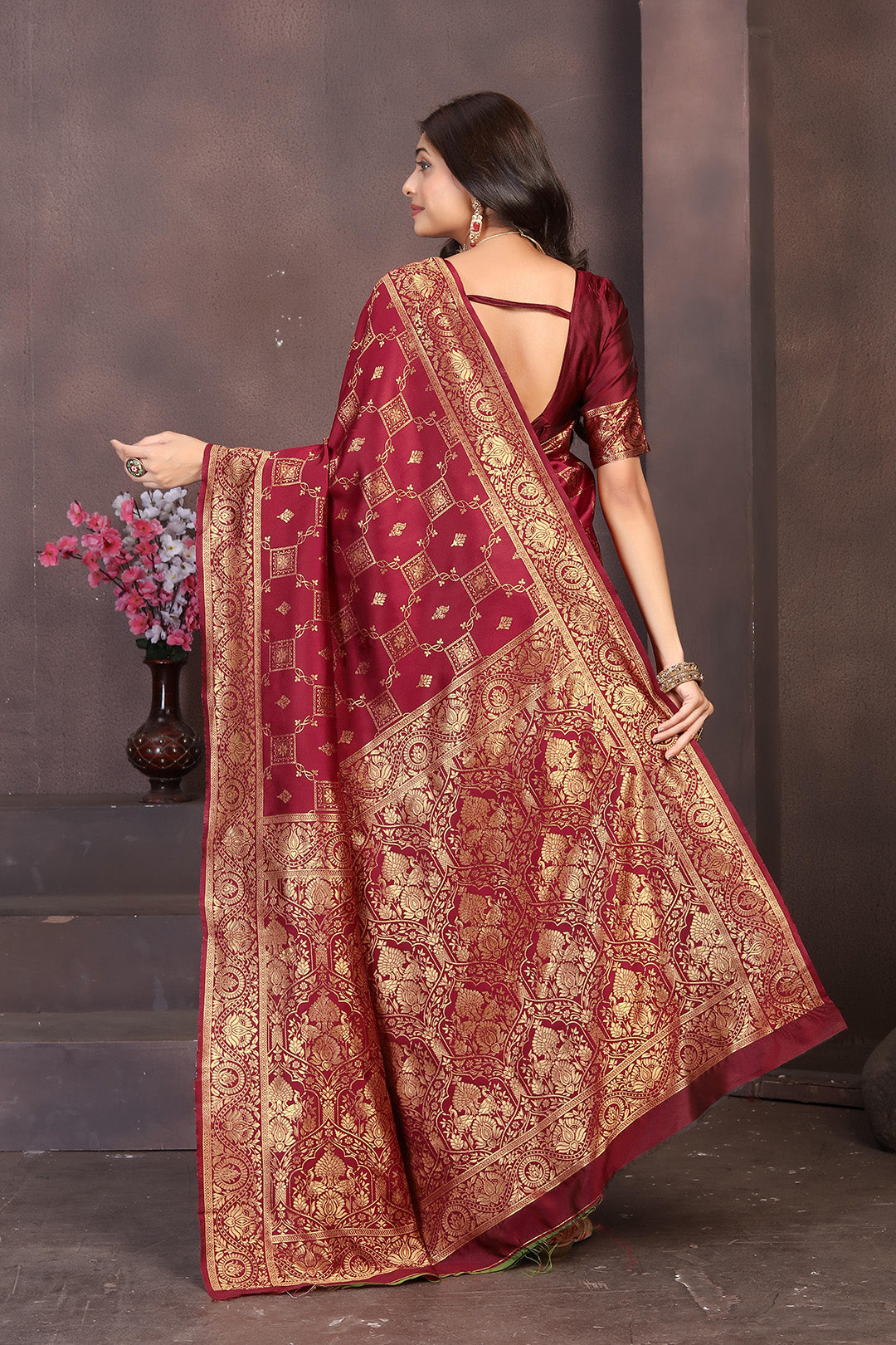 Rich Maroon Banarasi Silk Saree with Intricate Golden Zari Work