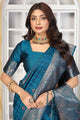 Peacock Blue Jacquard Silk Saree with Silver Zari & Multicolor Floral Buttas