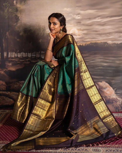 Green & Purple Kanjivaram Silk Saree with Rich Zari Border & Traditional Peacock Motifs