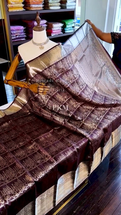 legant Espresso Brown Banarasi Soft Silk Saree with Silver Zari Weaving & Red Contrast Blouse