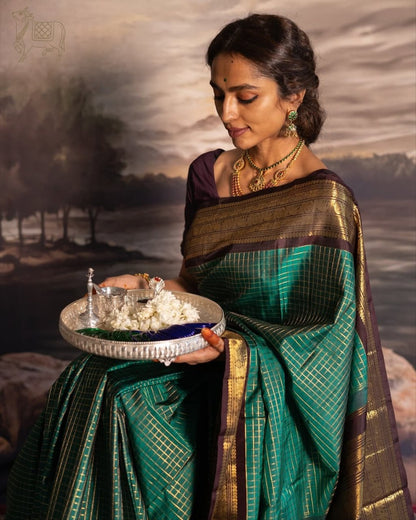 Green & Purple Kanjivaram Silk Saree with Rich Zari Border & Traditional Peacock Motifs