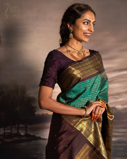 Green & Purple Kanjivaram Silk Saree with Rich Zari Border & Traditional Peacock Motifs