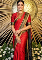 Celebrity-Inspired Red Silk Saree with Black & Gold Temple Border (Rashmika Wedding Style)