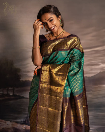 Green & Purple Kanjivaram Silk Saree with Rich Zari Border & Traditional Peacock Motifs