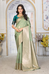 Pastel Pistachio Green Jacquard Silk Saree with Gold Zari & Teal Contrast Blouse