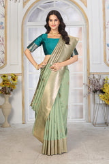 Pastel Pistachio Green Jacquard Silk Saree with Gold Zari & Teal Contrast Blouse