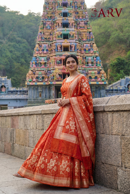 Royal Rust Orange Banarasi Silk Lehenga Set With Zari Floral Design