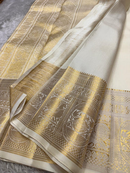 Kanjivaram Silk Saree with Rich Gold Zari Border & Traditional Butti Weaving