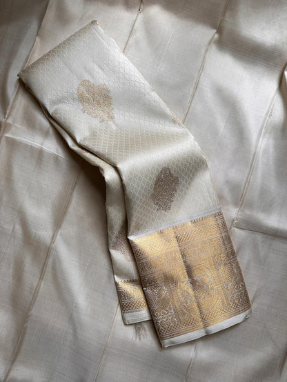 Kanjivaram Silk Saree with Rich Gold Zari Border & Traditional Butti Weaving