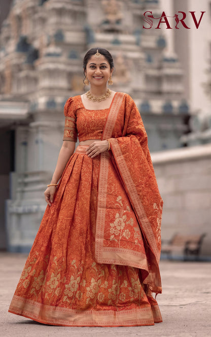 Royal Rust Orange Banarasi Silk Lehenga Set With Zari Floral Design