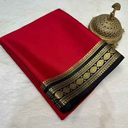 Celebrity-Inspired Red Silk Saree with Black & Gold Temple Border (Rashmika Wedding Style)