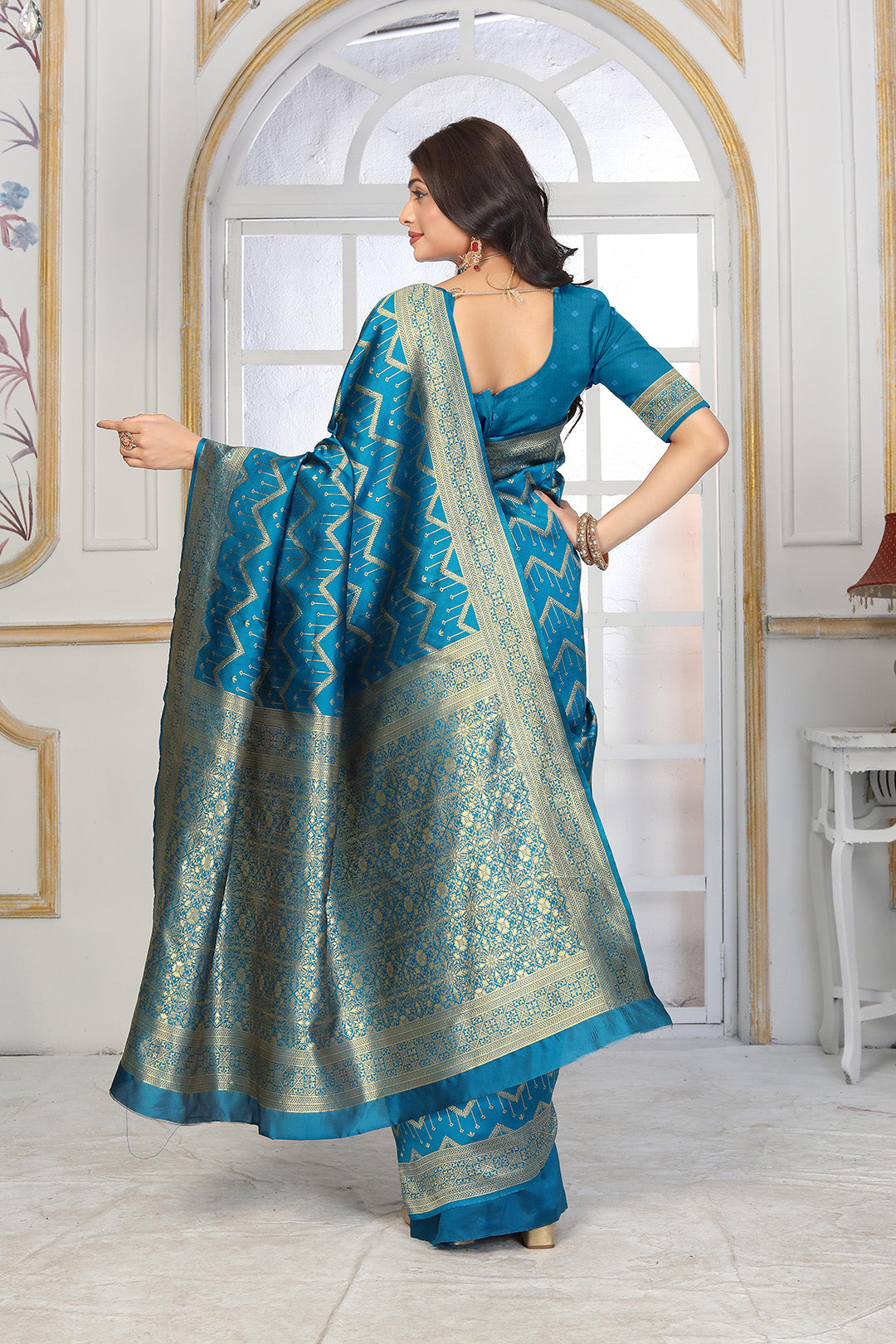 Teal Blue Banarasi Silk Saree with Geometric Zari Weaving and Rich Floral Pallu
