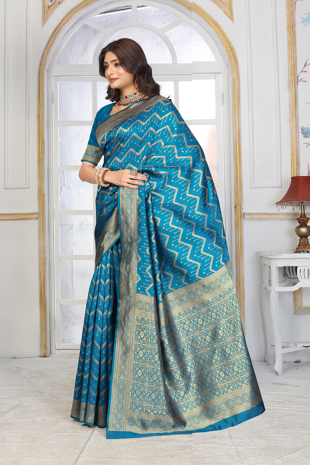Teal Blue Banarasi Silk Saree with Geometric Zari Weaving and Rich Floral Pallu