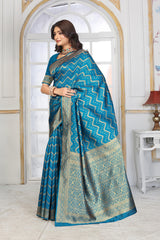 Teal Blue Banarasi Silk Saree with Geometric Zari Weaving and Rich Floral Pallu