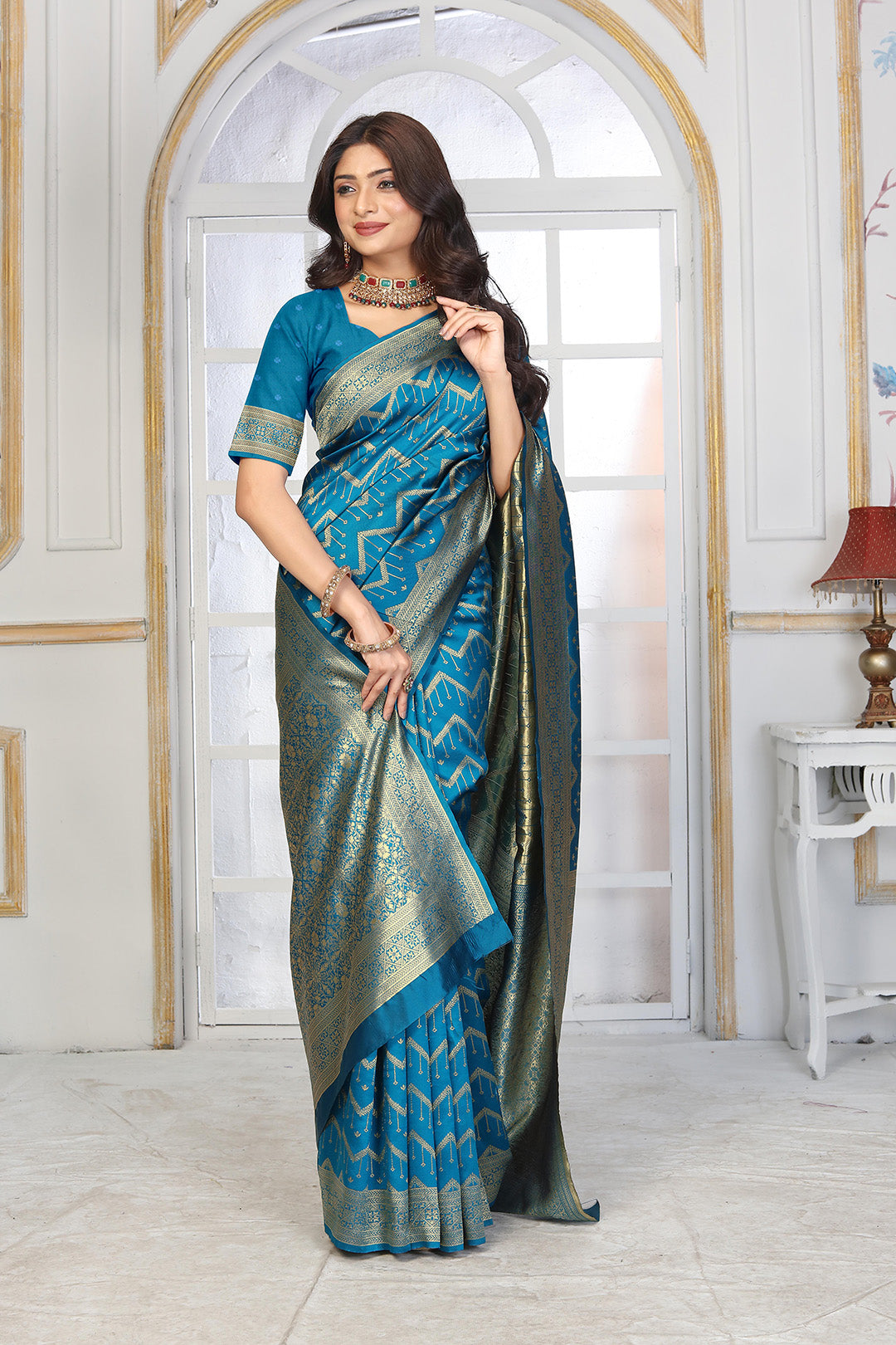 Teal Blue Banarasi Silk Saree with Geometric Zari Weaving and Rich Floral Pallu