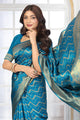 Teal Blue Banarasi Silk Saree with Geometric Zari Weaving and Rich Floral Pallu