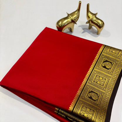 Red Silk Saree with Black & Gold Temple Border (celebrity-inspired Wedding Style)