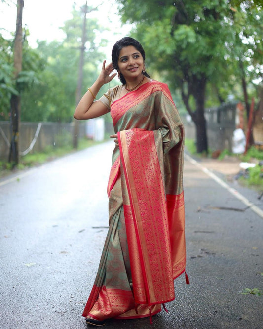 Sea Green Banarasi Soft Silk Saree with Pink Contrast Border & Gold Zari Weaving