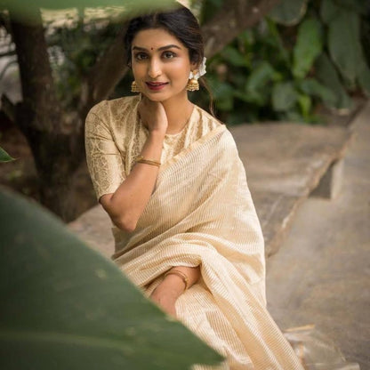Graceful Cream Banarasi Soft Silk Saree with Gold Zari Weaving