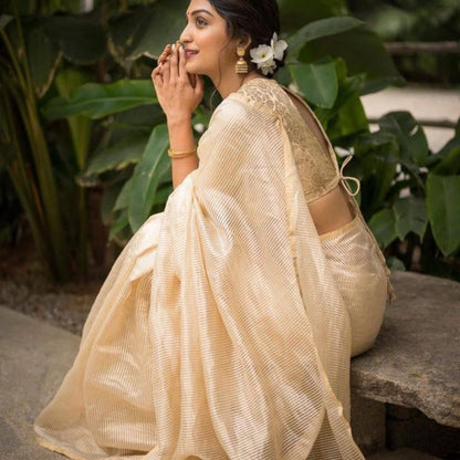 Graceful Cream Banarasi Soft Silk Saree with Gold Zari Weaving
