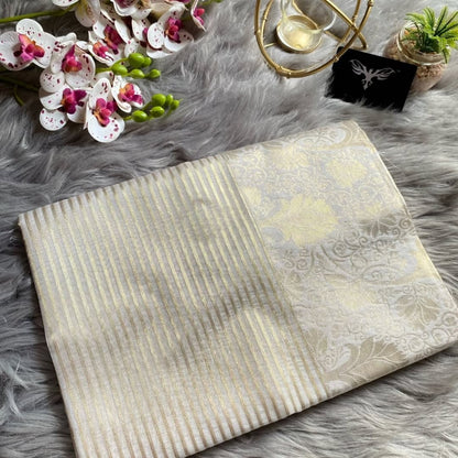 Graceful Cream Banarasi Soft Silk Saree with Gold Zari Weaving