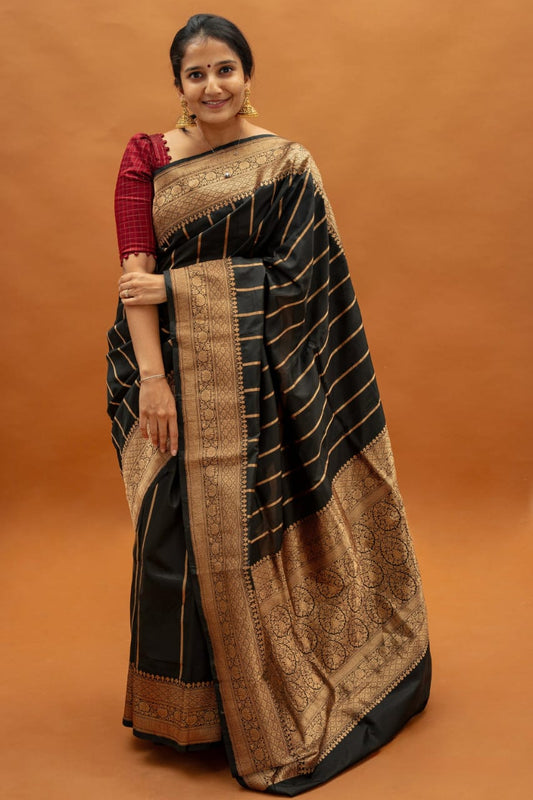 Classic Black Banarasi Soft Silk Saree with Golden Zari Border for Festive Wear