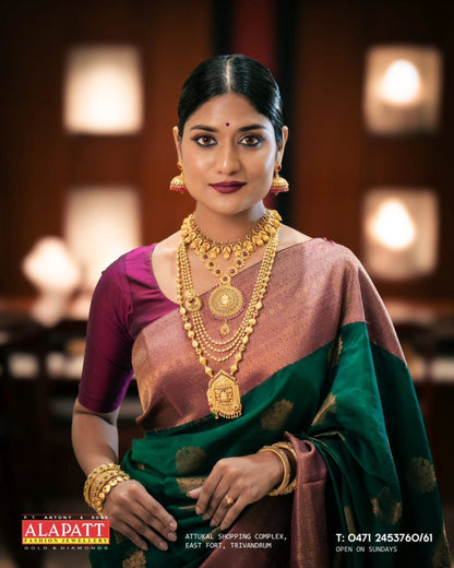 Varnika Majesty Banarasi Soft Silk Saree – Emerald Plum Dual Weave Edition