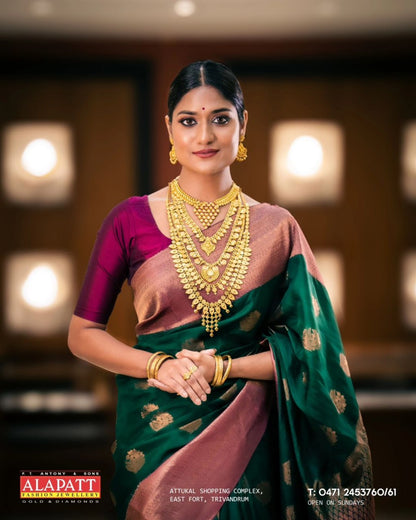 Varnika Majesty Banarasi Soft Silk Saree – Emerald Plum Dual Weave Edition