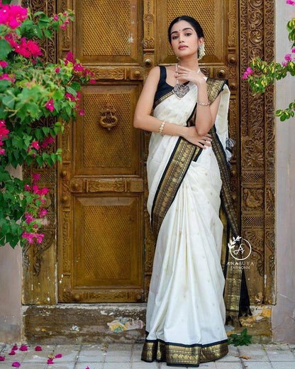 Devangana Ivory Noir Banarasi Soft Silk Saree – Timeless Elegance in Black & Gold Weave
