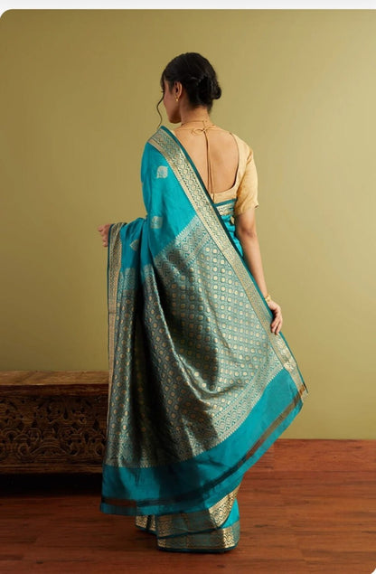 Aqua Blue Banarasi Soft Silk Saree with Gold & Silver Zari Weaving Border