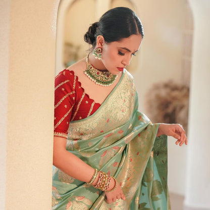 Mint Green Banarasi Silk Saree with Red Contrast Blouse and Gold Zari Weaving