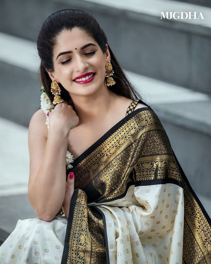 Ivory & Black Kanjivaram Silk Saree with Antique Gold Zari Border