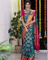 Royal Teal & Pink Kanjivaram Silk Saree with Golden Zari Weaving by StylistPot