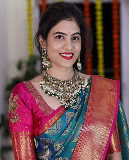 Royal Teal & Pink Kanjivaram Silk Saree with Golden Zari Weaving by StylistPot