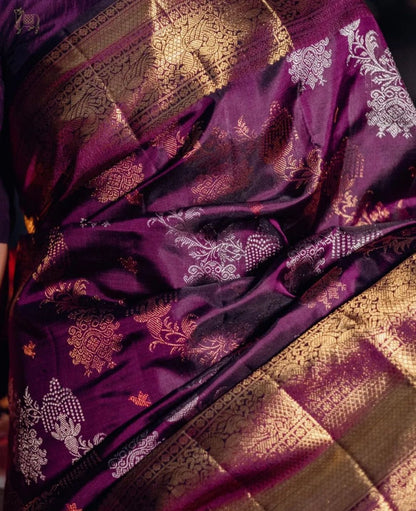Royal Plum Banarasi Soft Silk Saree with Golden Zari Weaving & Temple Motif Border
