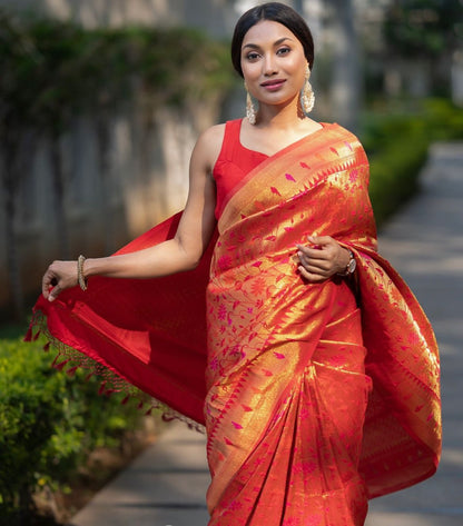 Red-Orange Banarasi Soft Silk Saree with Golden Zari Floral Weaving