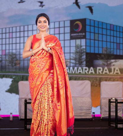 Red-Orange Banarasi Soft Silk Saree with Golden Zari Floral Weaving