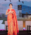 Red-Orange Banarasi Soft Silk Saree with Golden Zari Floral Weaving