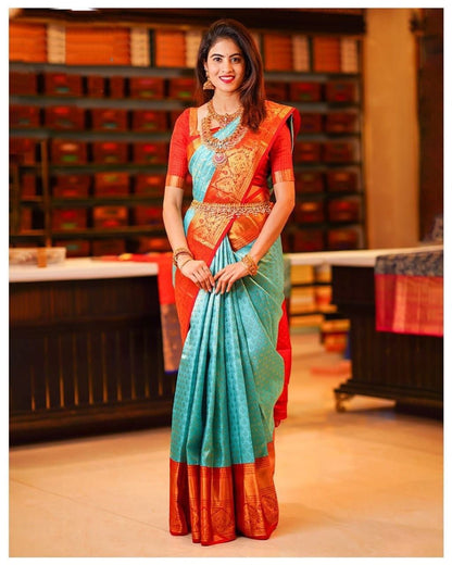 Sky Blue and Orange Banarasi Soft Silk Saree with Golden Zari Weaving and Rich Contrast Border