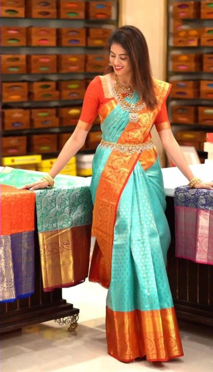 Sky Blue and Orange Banarasi Soft Silk Saree with Golden Zari Weaving and Rich Contrast Border