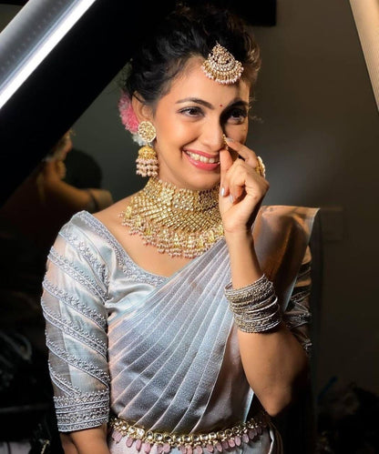 Silver Banarasi Soft Silk Saree with Diamond Zari Weaving and Pearl Finish Border