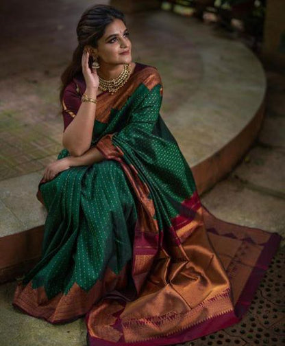 Emerald Green Banarasi Soft Silk Saree with Maroon Copper Zari Border and Traditional Butta Weaving