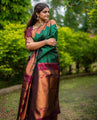 Emerald Green Banarasi Soft Silk Saree with Maroon Copper Zari Border and Traditional Butta Weaving
