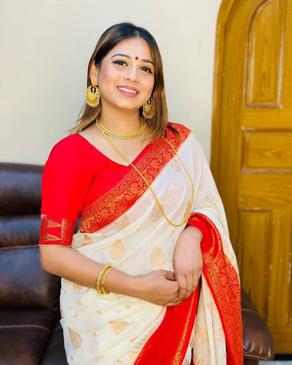 Classic White Banarasi Soft Silk Saree with Red Zari Border and Golden Butta Weaving
