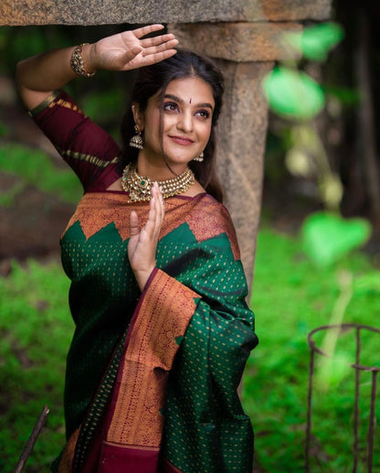 Emerald Green Banarasi Soft Silk Saree with Maroon Copper Zari Border and Traditional Butta Weaving