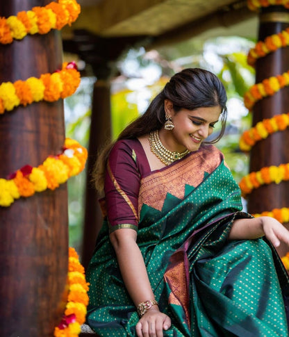 Emerald Green Banarasi Soft Silk Saree with Maroon Copper Zari Border and Traditional Butta Weaving